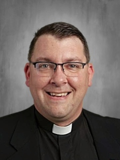 Father Garrett Kau