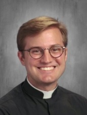 Father Andy Derouen